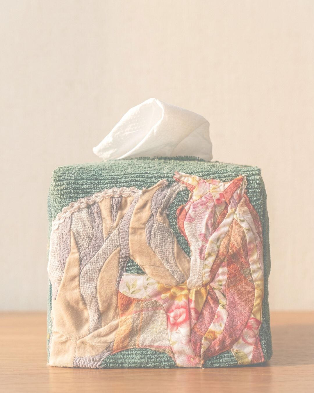 Walking Together Object Handcrafted textile tissue case displayed on a wooden table in Đà Nẵng.