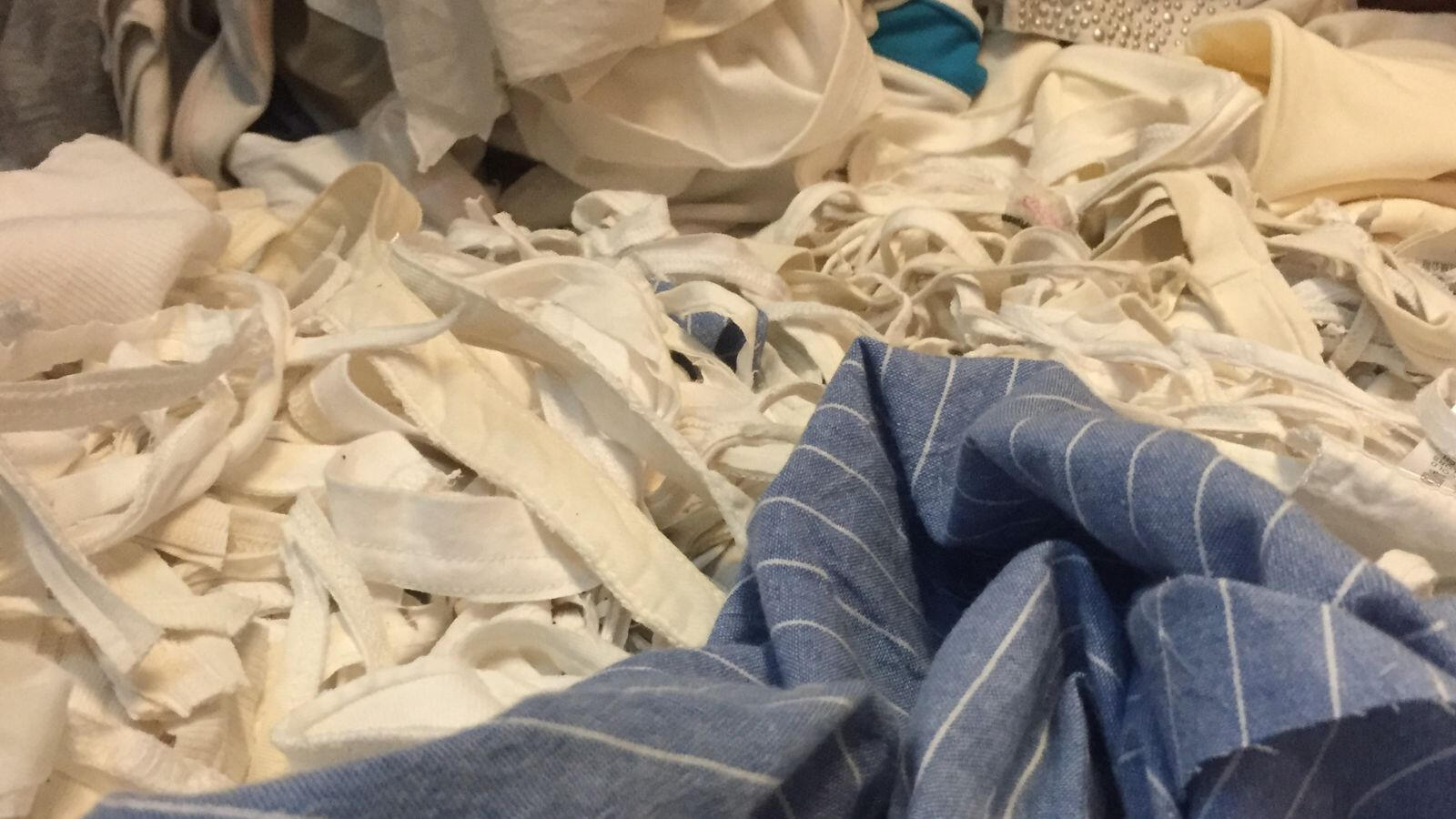 Textile recycling process Textile fibre recycling process showing breakdown of cotton materials